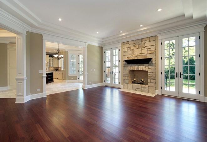 scuffed oak wood floors in a living room